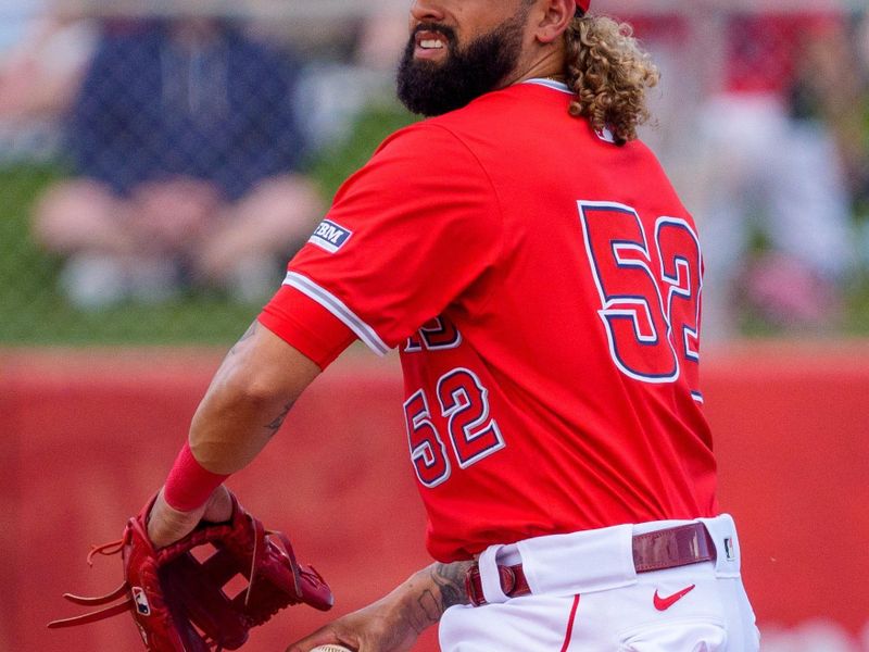 Mar 16, 2024; Tempe, Arizona, USA; Los Angeles Angels infielder Jack Lopez (52) fields the ball in the ninth during a spring training game against the Chicago Cubs at Tempe Diablo Stadium. Mandatory Credit: Allan Henry-USA TODAY Sports