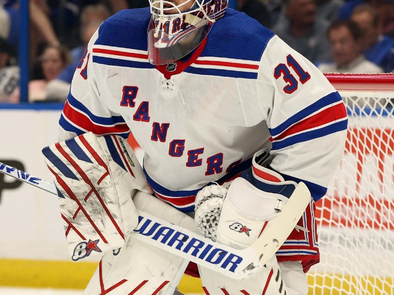 Mar 14, 2024; Tampa, Florida, USA; New York Rangers goaltender Igor Shesterkin (31) looks on against the Tampa Bay Lightning during the first period at Amalie Arena. Mandatory Credit: Kim Klement Neitzel-USA TODAY Sports