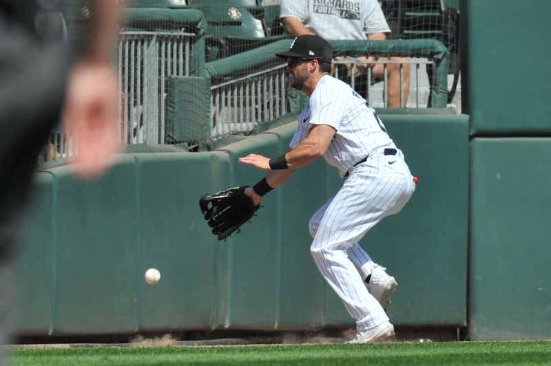 Aug 25, 2024; Chicago, Illinois, USA; Chicago White Sox left fielder Andrew Benintendi (23) is unable to catch Detroit Tigers center fielder Parker Meadows’ (not pictured) triple during the fourth inning at Guaranteed Rate Field. Mandatory Credit: Patrick Gorski-USA TODAY Sports