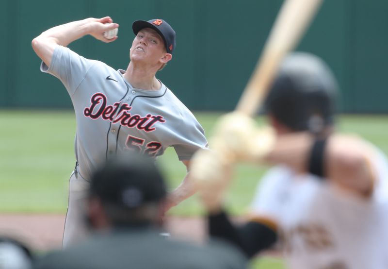 Jul 23, 2025; Pittsburgh, Pennsylvania, USA;  Detroit Tigers starting pitcher Troy Melton (52) delivers a pitch in his major league debut during the first inning against  Pittsburgh Pirates right fielder Bryan Reynolds (10) at PNC Park. Mandatory Credit: Charles LeClaire-Imagn Images