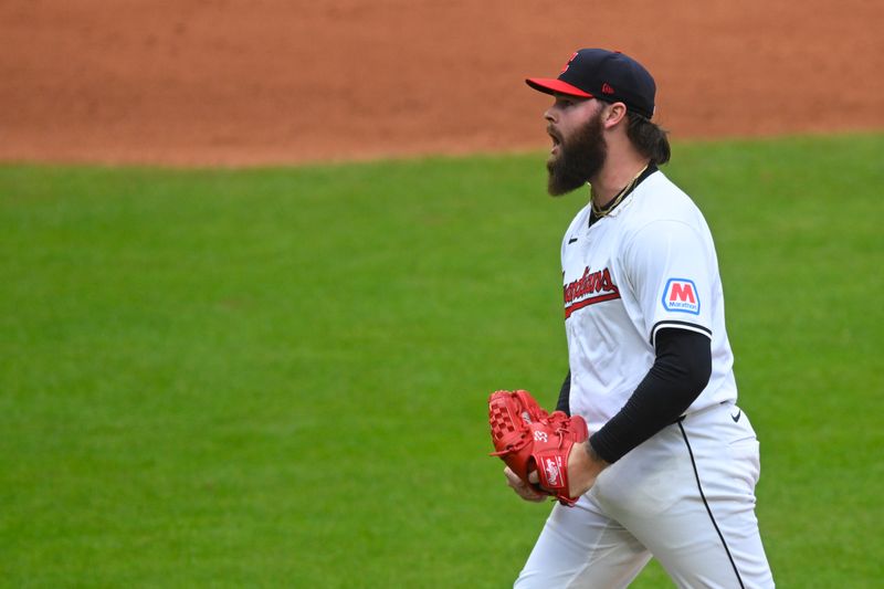 Oct 12, 2024; Cleveland, Ohio, USA; Cleveland Guardians pitcher Hunter Gaddis (33) celebrates a strike out in the sixth inning against the Detroit Tigers during game five of the ALDS for the 2024 MLB Playoffs at Progressive Field. Mandatory Credit: David Richard-Imagn Images