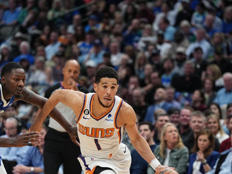 DALLAS, TX - DECEMBER 5: Devin Booker #1 of the Phoenix Suns drives to the basket during the game against the Dallas Mavericks on December 5, 2022 at the American Airlines Center in Dallas, Texas. NOTE TO USER: User expressly acknowledges and agrees that, by downloading and or using this photograph, User is consenting to the terms and conditions of the Getty Images License Agreement. Mandatory Copyright Notice: Copyright 2022 NBAE (Photo by Glenn James/NBAE via Getty Images)