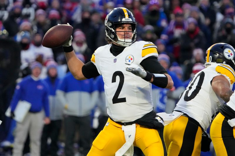 Pittsburgh Steelers quarterback Mason Rudolph (2) throws the ball against the Buffalo Bills during an NFL wild-card playoff football game against the Buffalo Bills, Monday, Jan. 15, 2024 in in Orchard Park, NY. (AP Photo/Rick Scuteri)