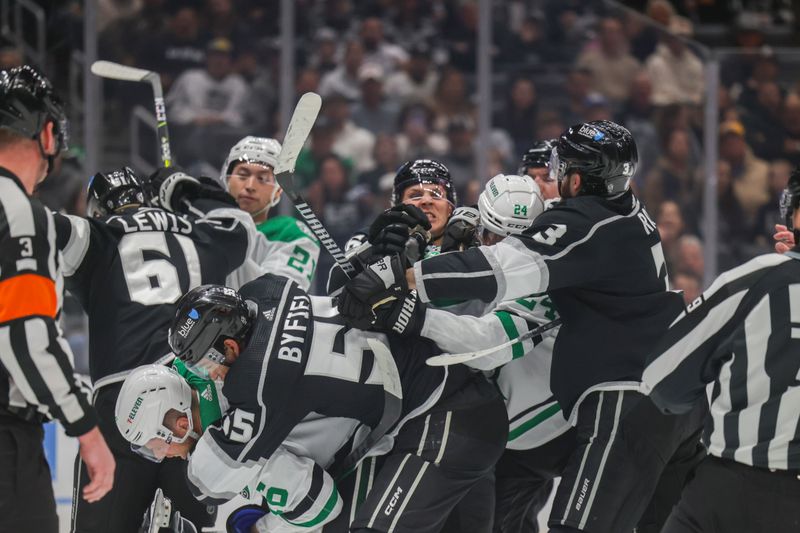 Mar 9, 2024; Los Angeles, California, USA; Members of the Dallas Stars and the Los Angeles Kings fight during the first period at Crypto.com Arena. Mandatory Credit: Yannick Peterhans-USA TODAY Sports