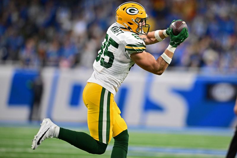 Green Bay Packers tight end Tucker Kraft catches a pass during the first half of an NFL football game against the Detroit Lions, Thursday, Nov. 23, 2023, in Detroit. The Packers won 29-22. (AP Photo/David Dermer)