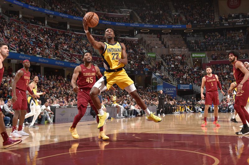 CLEVELAND, OH - APRIL 12: Aaron Nesmith #23 of the Indiana Pacers dribbles the ball during the game against the Cleveland Cavaliers on April 12, 2024 at Rocket Mortgage FieldHouse in Cleveland, Ohio. NOTE TO USER: User expressly acknowledges and agrees that, by downloading and/or using this Photograph, user is consenting to the terms and conditions of the Getty Images License Agreement. Mandatory Copyright Notice: Copyright 2024 NBAE (Photo by David Liam Kyle/NBAE via Getty Images)