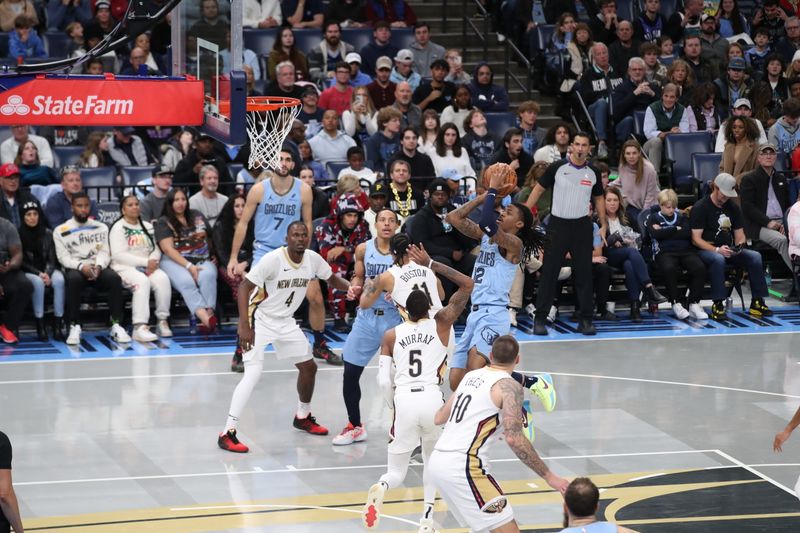 MEMPHIS, TN - NOVEMBER 29: Ja Morant #12 of the Memphis Grizzlies drives to the basket during the game against the New Orleans Pelicans during the Emirates NBA Cup game on November 29, 2024 at FedExForum in Memphis, Tennessee. NOTE TO USER: User expressly acknowledges and agrees that, by downloading and or using this photograph, User is consenting to the terms and conditions of the Getty Images License Agreement. Mandatory Copyright Notice: Copyright 2024 NBAE (Photo by Joe Murphy/NBAE via Getty Images)