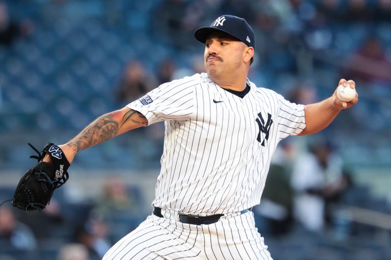 Apr 25, 2024; Bronx, New York, USA; New York Yankees starting pitcher Nestor Cortes (65) delivers a pitch during the first inning against the Oakland Athletics at Yankee Stadium. Mandatory Credit: Vincent Carchietta-USA TODAY Sports