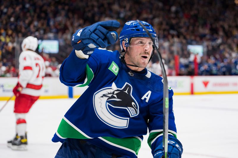 Oct 24, 2022; Vancouver, British Columbia, CAN; Vancouver Canucks forward J.T. Miller (9) celebrates his second goal of the game against Carolina Hurricanes in the third period at Rogers Arena. Carolina won 3-2. Mandatory Credit: Bob Frid-USA TODAY Sports