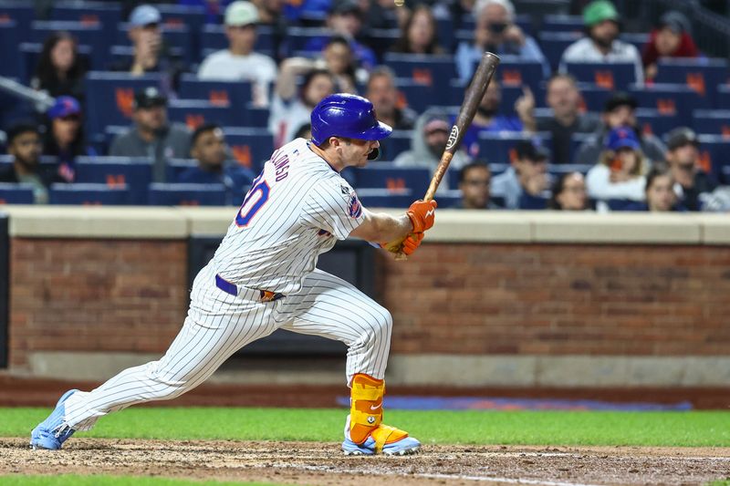 May 30, 2024; New York City, New York, USA; New York Mets pinch hitter Pete Alonso (20) hits a double in the seventh inning against the Arizona Diamondbacks at Citi Field. Mandatory Credit: Wendell Cruz-USA TODAY Sports