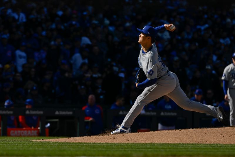 Apr 6, 2024; Chicago, Illinois, USA;  Los Angeles Dodgers pitcher Yoshinobu Yamamoto (18) delivers against the Chicago Cubs during the first inning at Wrigley Field. Mandatory Credit: Matt Marton-USA TODAY Sports