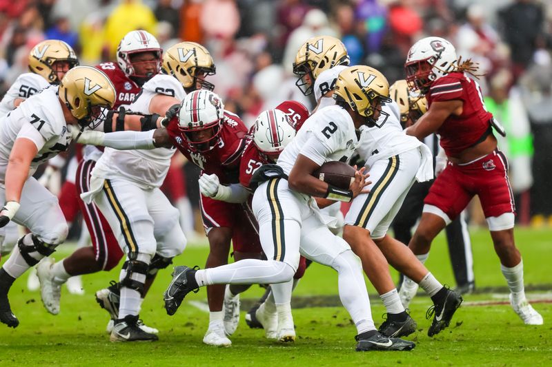 Nov 11, 2023; Columbia, South Carolina, USA; Vanderbilt Commodores quarterback Walter Taylor (2) runs the ball against the South Carolina Gamecocks in the second quarter at Williams-Brice Stadium. Mandatory Credit: Jeff Blake-USA TODAY Sports