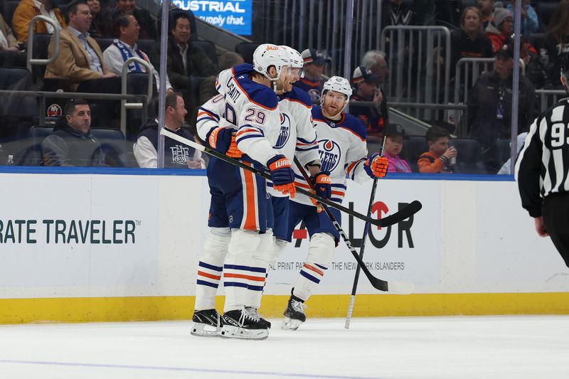 Mar 14, 2025; Elmont, New York, USA; Edmonton Oilers center Leon Draisaitl (29) celebrates his goal against the New York Islanders during the second period at UBS Arena. Mandatory Credit: Thomas Salus-Imagn Images