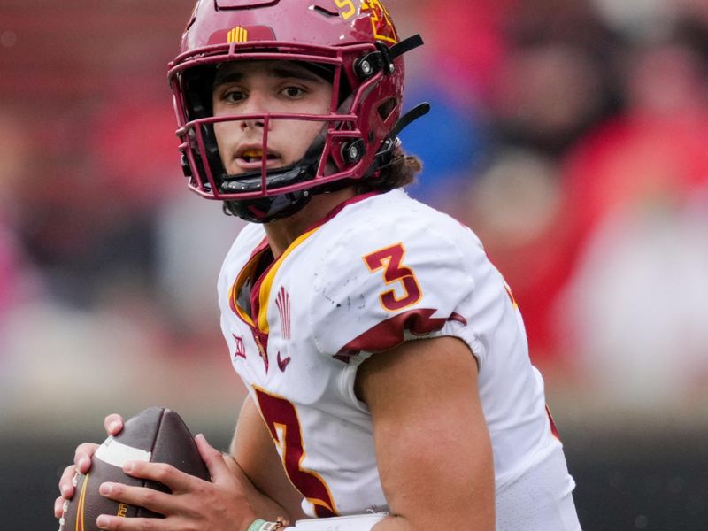 Oct 14, 2023; Cincinnati, Ohio, USA;  Iowa State Cyclones quarterback Rocco Becht (3) runs with the ball as he looks to pass against the Cincinnati Bearcats in the second half at Nippert Stadium. Mandatory Credit: Aaron Doster-USA TODAY Sports