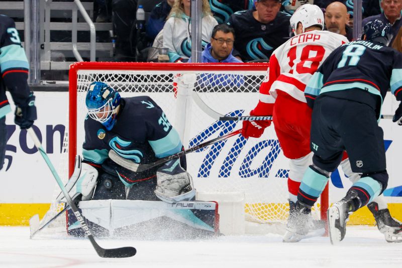 Feb 19, 2024; Seattle, Washington, USA; Seattle Kraken goaltender Joey Daccord (35) makes a save against the Detroit Red Wings during the second period at Climate Pledge Arena. Mandatory Credit: Joe Nicholson-USA TODAY Sports