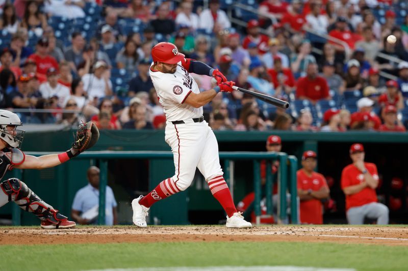 Jul 19, 2024; Washington, District of Columbia, USA; Washington Nationals first base Juan Yepez (18) hits a three run home run against the Cincinnati Reds during the fifth inning at Nationals Park. Mandatory Credit: Geoff Burke-USA TODAY Sports