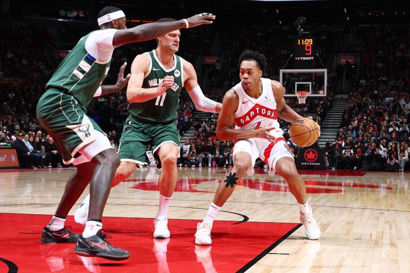 TORONTO, CANADA - JANUARY 6: Scottie Barnes #4 of the Toronto Raptors drives to the basket during the game against the Milwaukee Bucks on January 6, 2025 at the Scotiabank Arena in Toronto, Ontario, Canada.  NOTE TO USER: User expressly acknowledges and agrees that, by downloading and or using this Photograph, user is consenting to the terms and conditions of the Getty Images License Agreement.  Mandatory Copyright Notice: Copyright 2025 NBAE (Photo by Vaughn Ridley/NBAE via Getty Images)