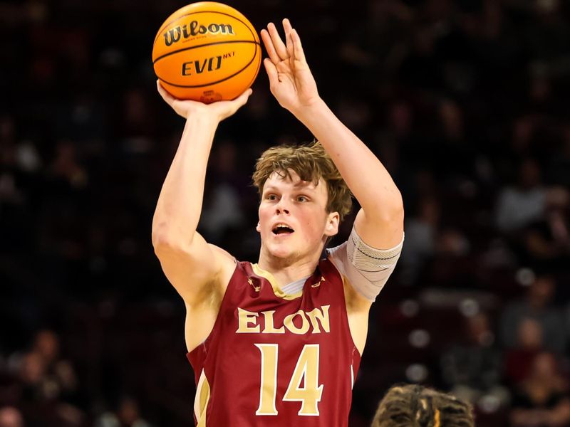 Dec 22, 2023; Columbia, South Carolina, USA; Elon Phoenix guard Zac Ervin (14) shoots over South Carolina Gamecocks guard Myles Stute (10) in the second half at Colonial Life Arena. Mandatory Credit: Jeff Blake-USA TODAY Sports