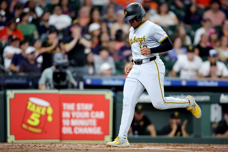 Jul 31, 2024; Houston, Texas, USA; Pittsburgh Pirates third baseman Ke'Bryan Hayes (13) scores a run against the Houston Astros during the second inning at Minute Maid Park. Mandatory Credit: Erik Williams-USA TODAY Sports