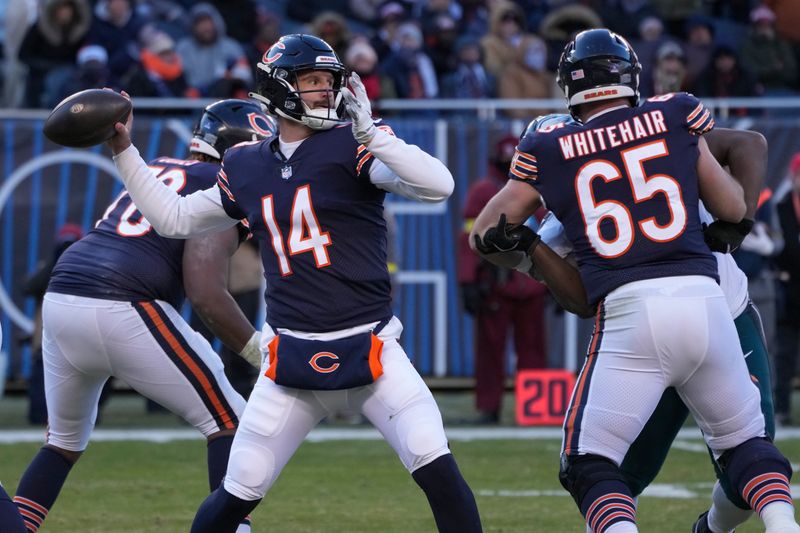 Chicago Bears' Nathan Peterman passes during the second half of an NFL football game against the Philadelphia Eagles, Sunday, Dec. 18, 2022, in Chicago. (AP Photo/Charles Rex Arbogast)