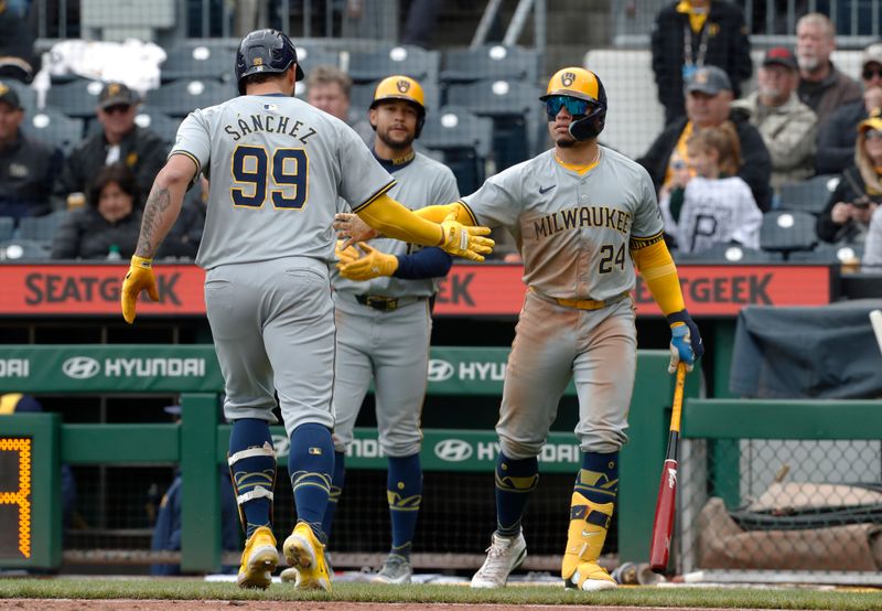 Apr 25, 2024; Pittsburgh, Pennsylvania, USA;  Milwaukee Brewers pinch hitter Gary Sánchez (99) celebrates his two run home run with catcher William Contreras (24) against the Pittsburgh Pirates during the eighth inning at PNC Park. The Brewers won 7-5. Mandatory Credit: Charles LeClaire-USA TODAY Sports