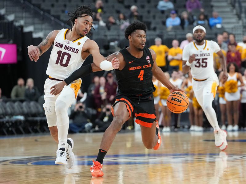 Mar 8, 2023; Las Vegas, NV, USA; Oregon State Beavers guard Dexter Akanno (4) dribles against Arizona State Sun Devils guard Frankie Collins (10) during the second half at T-Mobile Arena. Mandatory Credit: Stephen R. Sylvanie-USA TODAY Sports