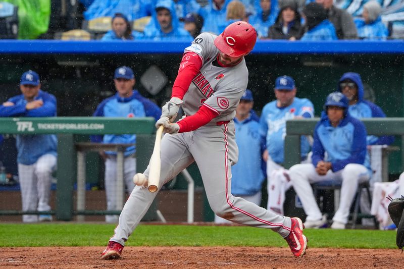 May 26, 2025; Kansas City, Missouri, USA; Cincinnati Reds third baseman Gavin Lux (2) hits a one run single against the Kansas City Royals in the third inning at Kauffman Stadium. Mandatory Credit: Denny Medley-Imagn Images