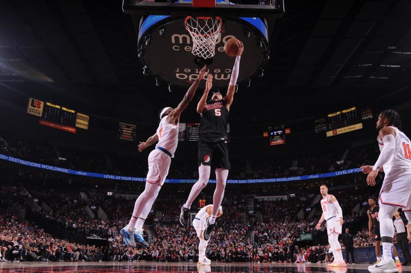 PORTLAND, OR - MARCH 14: Dalano Banton #5 of the Portland Trail Blazers drives to the basket during the game against the New York Knicks on March 14, 2024 at the Moda Center Arena in Portland, Oregon. NOTE TO USER: User expressly acknowledges and agrees that, by downloading and or using this photograph, user is consenting to the terms and conditions of the Getty Images License Agreement. Mandatory Copyright Notice: Copyright 2024 NBAE (Photo by Cameron Browne/NBAE via Getty Images)