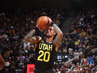 SALT LAKE CITY, UT - DECEMBER 30: John Collins #20 of the Utah Jazz shoots a three point basket during the game against the Miami Heat on December 30, 2023 at Delta Center in Salt Lake City, Utah. NOTE TO USER: User expressly acknowledges and agrees that, by downloading and or using this Photograph, User is consenting to the terms and conditions of the Getty Images License Agreement. Mandatory Copyright Notice: Copyright 2023 NBAE (Photo by Melissa Majchrzak/NBAE via Getty Images)