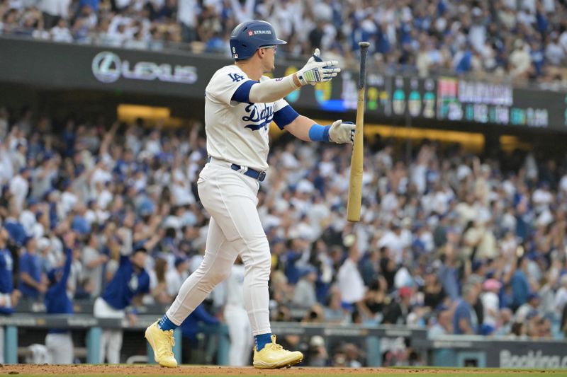 Oct 11, 2024; Los Angeles, California, USA; Los Angeles Dodgers third baseman Enrique Hernandez (8) celebrates after hitting a solo home run in the second inning against the San Diego Padres during game five of the NLDS for the 2024 MLB Playoffs at Dodger Stadium. Mandatory Credit: Jayne Kamin-Oncea-Imagn Images