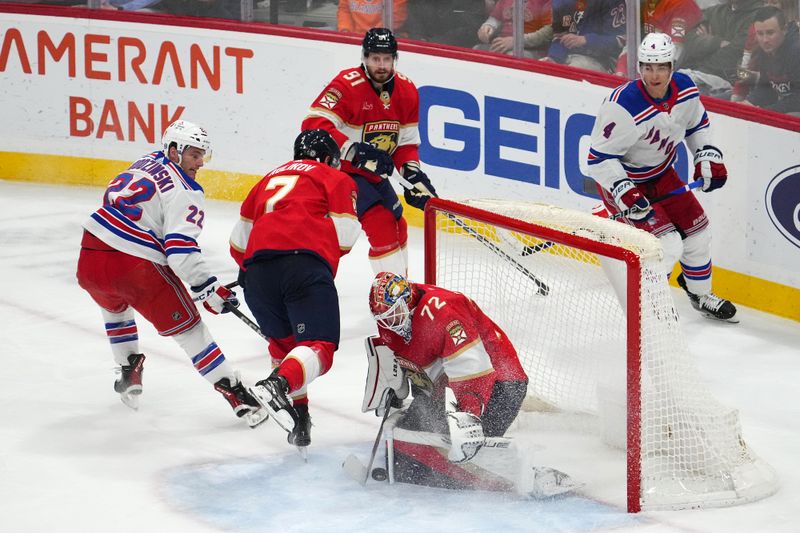 Dec 29, 2023; Sunrise, Florida, USA; Florida Panthers goaltender Sergei Bobrovsky (72) stops the shot of New York Rangers center Jonny Brodzinski (22) during the third period at Amerant Bank Arena. Mandatory Credit: Jasen Vinlove-USA TODAY Sports