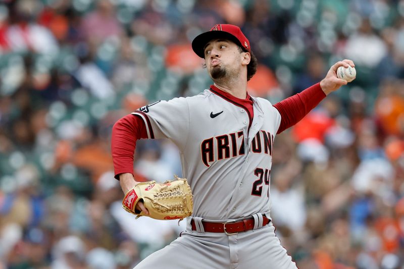 Jun 11, 2023; Detroit, Michigan, USA; Arizona Diamondbacks relief pitcher Kyle Nelson (24) pitches in the sixth inning against the Detroit Tigers at Comerica Park. Mandatory Credit: Rick Osentoski-USA TODAY Sports