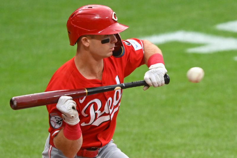 Jun 10, 2025; Cleveland, Ohio, USA; Cincinnati Reds second baseman Matt McLain (9) looks to bunt in the fifth inning against the Cleveland Guardians at Progressive Field. Mandatory Credit: David Richard-Imagn Images Jun 10, 2025; Cleveland, Ohio, USA; Cincinnati Reds second baseman Matt McLain (9) looks to bunt in the fifth inning against the Cleveland Guardians at Progressive Field. Mandatory Credit: David Richard-Imagn Images