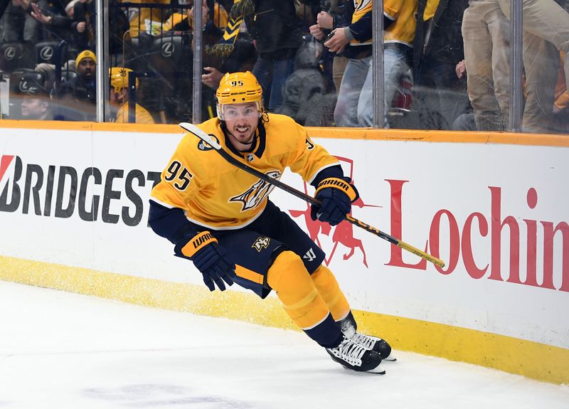 Jan 21, 2023; Nashville, Tennessee, USA; Nashville Predators center Matt Duchene (95) celebrates after a goal during the third period against the Los Angeles Kings at Bridgestone Arena. Mandatory Credit: Christopher Hanewinckel-USA TODAY Sports