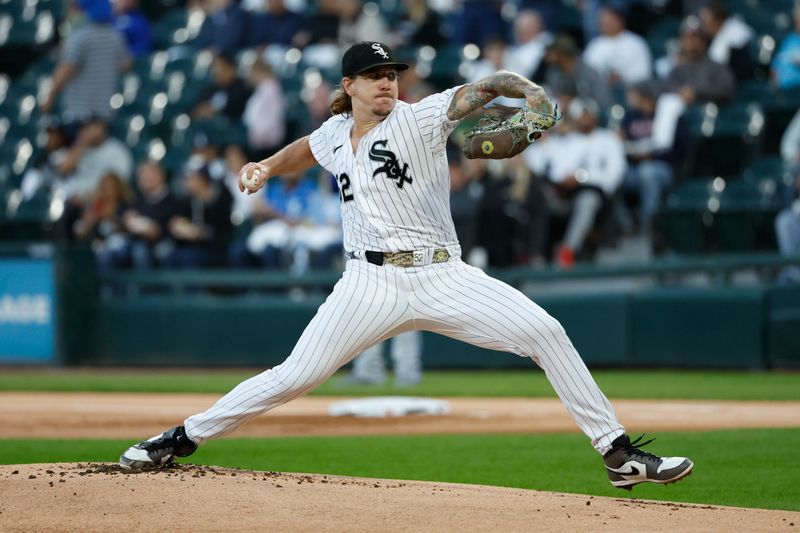 Sep 13, 2023; Chicago, Illinois, USA; Chicago White Sox starting pitcher Mike Clevinger (52) delivers a pitch against the Kansas City Royals during the first inning at Guaranteed Rate Field. Mandatory Credit: Kamil Krzaczynski-USA TODAY Sports