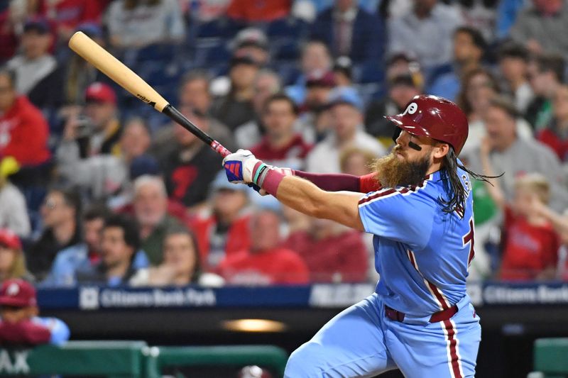 Apr 11, 2024; Philadelphia, Pennsylvania, USA; Philadelphia Phillies outfielder Brandon Marsh (16) watches his two run home run against the Pittsburgh Pirates during the seventh inning at Citizens Bank Park. Mandatory Credit: Eric Hartline-USA TODAY Sports