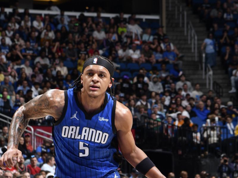 ORLANDO, FL - APRIL 1: Paolo Banchero #5 of the Orlando Magic drives to the basket during the game against the Portland Trail Blazers on April 1, 2024 at Kia Center in Orlando, Florida. NOTE TO USER: User expressly acknowledges and agrees that, by downloading and or using this photograph, User is consenting to the terms and conditions of the Getty Images License Agreement. Mandatory Copyright Notice: Copyright 2024 NBAE (Photo by Fernando Medina/NBAE via Getty Images)