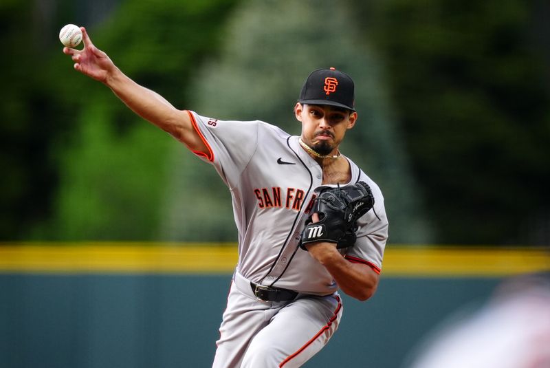 May 8, 2024; Denver, Colorado, USA; San Francisco Giants starting pitcher Jordan Hicks (12) delivers a pitch in the first inning against the Colorado Rockies at Coors Field. Mandatory Credit: Ron Chenoy-USA TODAY Sports