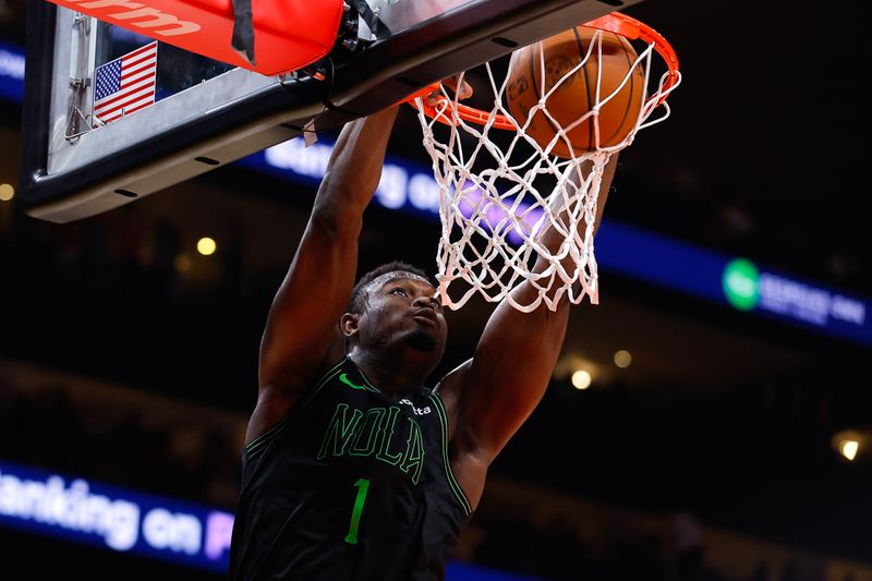 ATLANTA, GEORGIA - MARCH 10: Zion Williamson #1 of the New Orleans Pelicans dunks during the fourth quarter against the Atlanta Hawks at State Farm Arena on March 10, 2024 in Atlanta, Georgia. NOTE TO USER: User expressly acknowledges and agrees that, by downloading and or using this photograph, User is consenting to the terms and conditions of the Getty Images License Agreement. (Photo by Todd Kirkland/Getty Images)