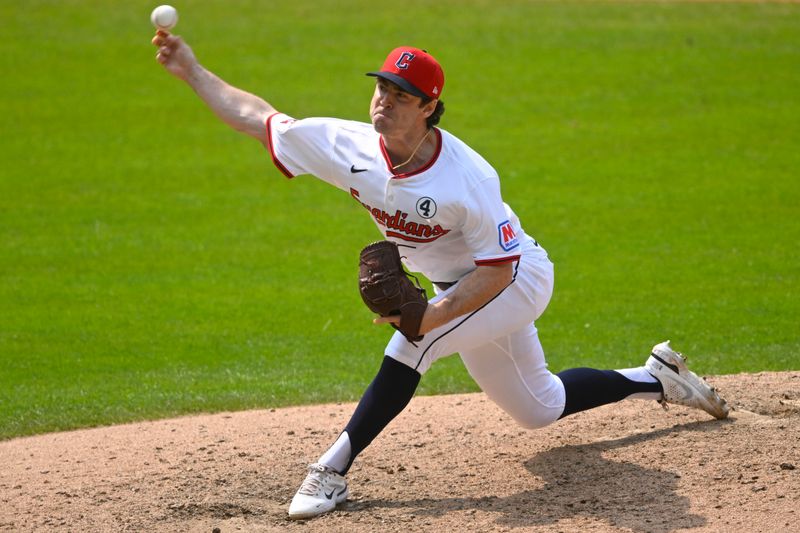 Jun 1, 2025; Cleveland, Ohio, USA; Cleveland Guardians relief pitcher Matt Festa (52) delivers a pitch in the eighth inning against the Los Angeles Angels at Progressive Field. Mandatory Credit: David Richard-Imagn Images