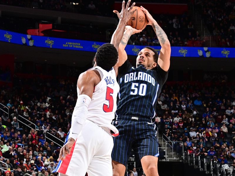 DETROIT, MI - JANUARY 1: Cole Anthony #50 of the Orlando Magic shoots the ball during the game against the Detroit Pistons on January 1, 2025 at Little Caesars Arena in Detroit, Michigan. NOTE TO USER: User expressly acknowledges and agrees that, by downloading and/or using this photograph, User is consenting to the terms and conditions of the Getty Images License Agreement. Mandatory Copyright Notice: Copyright 2025 NBAE (Photo by Chris Schwegler/NBAE via Getty Images)