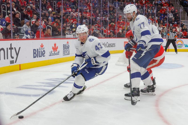 Jan 21, 2024; Detroit, Michigan, USA; Tampa Bay Lightning defenseman Darren Raddysh (43) handles the puck during the second period against the Detroit Red Wings at Little Caesars Arena. Mandatory Credit: Brian Bradshaw Sevald-USA TODAY Sports