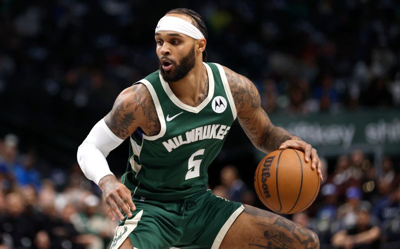 DALLAS, TX -OCTOBER 17: Gary Trent Jr. #5 of the Milwaukee Bucks handles the ball as the Milwaukee Bucks take on the Dallas Mavericks in the first half of an NBA preseason game at American Airlines Center on October 17, 2024 in Dallas, Texas. NOTE TO USER: User expressly acknowledges and agrees that, by downloading and or using this photograph, User is consenting to the terms and conditions of the Getty Images License Agreement. (Photo by Ron Jenkins/Getty Images)