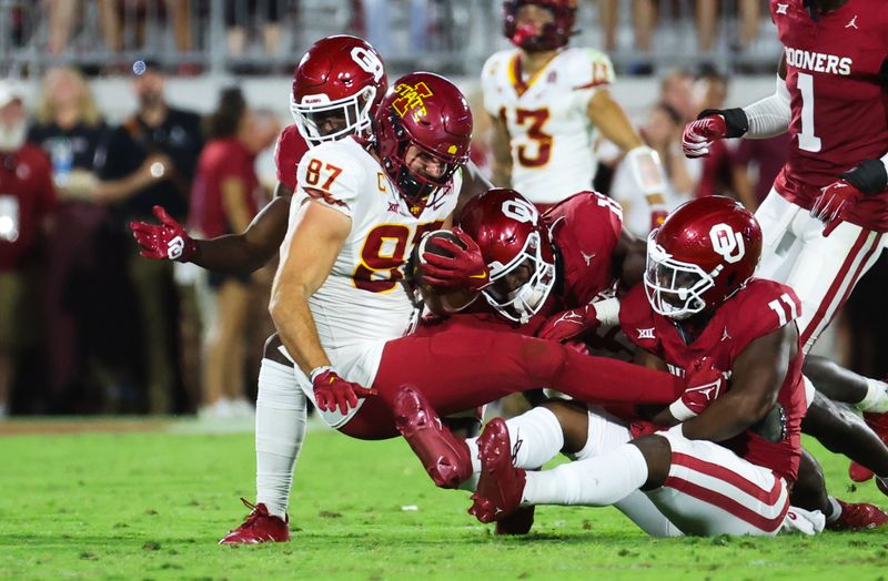 Sep 30, 2023; Norman, Oklahoma, USA; Oklahoma Sooners linebacker Kobie McKinzie (11) tackles Iowa State Cyclones tight end Easton Dean (87) during the second half at Gaylord Family-Oklahoma Memorial Stadium. Mandatory Credit: Kevin Jairaj-USA TODAY Sports