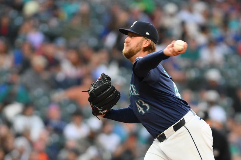 Jun 10, 2024; Seattle, Washington, USA; Seattle Mariners relief pitcher Kirby Snead (43) pitches to the Chicago White Sox during the eighth inning at T-Mobile Park. Mandatory Credit: Steven Bisig-USA TODAY Sports