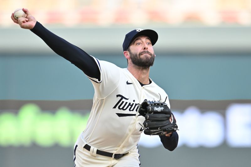 Aug 27, 2023; Minneapolis, Minnesota, USA; Minnesota Twins relief pitcher Dylan Floro (58) throws a pitch against the Texas Rangers during the thirteenth inning at Target Field. Mandatory Credit: Jeffrey Becker-USA TODAY Sports