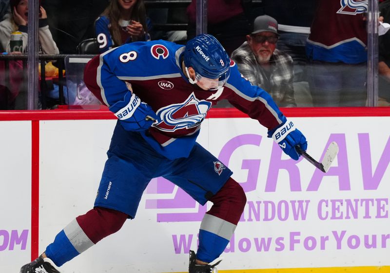 Nov 9, 2024; Denver, Colorado, USA; Colorado Avalanche defenseman Cale Makar (8) celebrates his goal in the second period against the Carolina Hurricanes at Ball Arena. Mandatory Credit: Ron Chenoy-Imagn Images