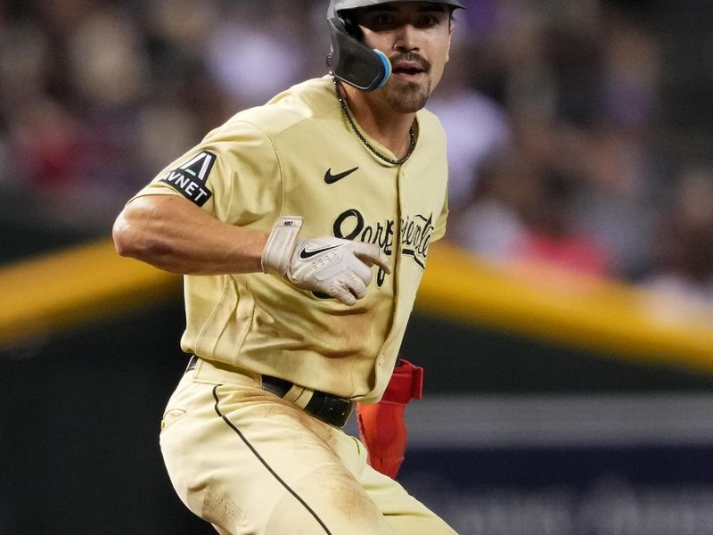 Sep 2, 2023; Phoenix, Arizona, USA; Arizona Diamondbacks right fielder Corbin Carroll (7) leads off third base against the Baltimore Orioles during the third inning at Chase Field. Mandatory Credit: Joe Camporeale-USA TODAY Sports