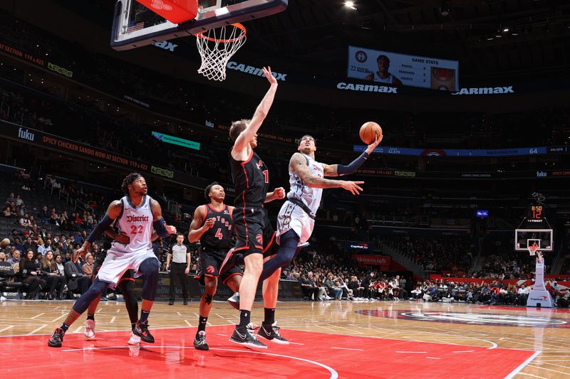 WASHINGTON, DC -?JANUARY 29: Kyle Kuzma #33 of the Washington Wizards drives to the basket during the game against the Toronto Raptors on January 29, 2025 at Capital One Arena in Washington, DC. NOTE TO USER: User expressly acknowledges and agrees that, by downloading and or using this Photograph, user is consenting to the terms and conditions of the Getty Images License Agreement. Mandatory Copyright Notice: Copyright 2025 NBAE (Photo by Stephen Gosling/NBAE via Getty Images)