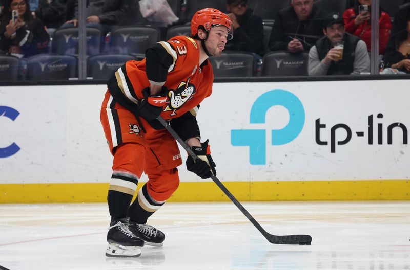 Mar 11, 2025; Anaheim, California, USA; Anaheim Ducks center Mason McTavish (23) shoots during the second period against the Washington Capitals at Honda Center. Mandatory Credit: Jason Parkhurst-Imagn Images